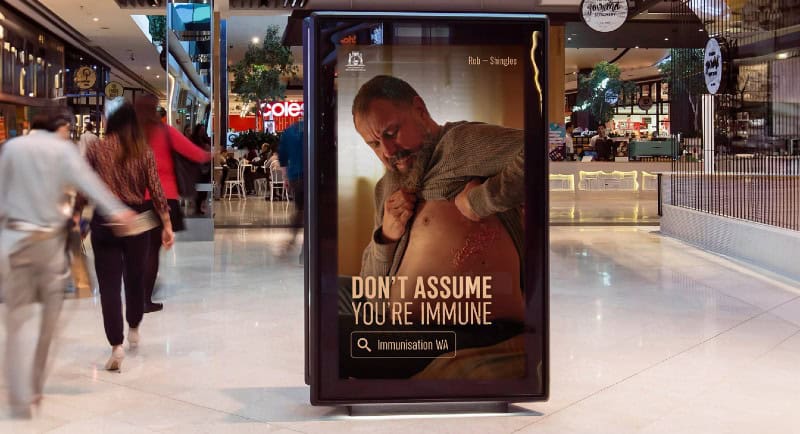 303MullenLowe, Mediahub & Carat launch vaccine awareness campaign, 'Don't Assume You're Immune' OOH Ad